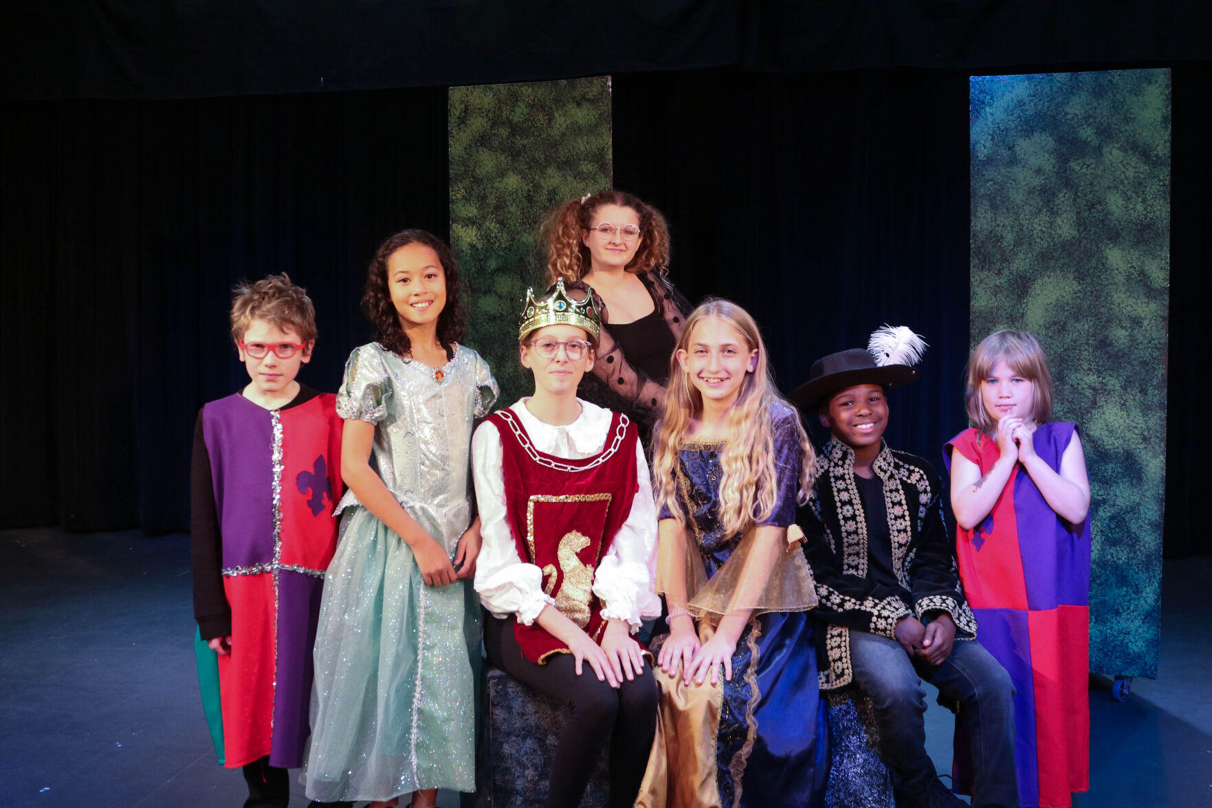 Photo by Sam McClenaghan with permission to reprint. From left to right: Brycen Inglesby, Chloe Thongteum, Kazie Goad, Mia Case, Lilly Allen, Emmanuel Williams, and Faith Mercede performing in “The Invisible Dragon.”